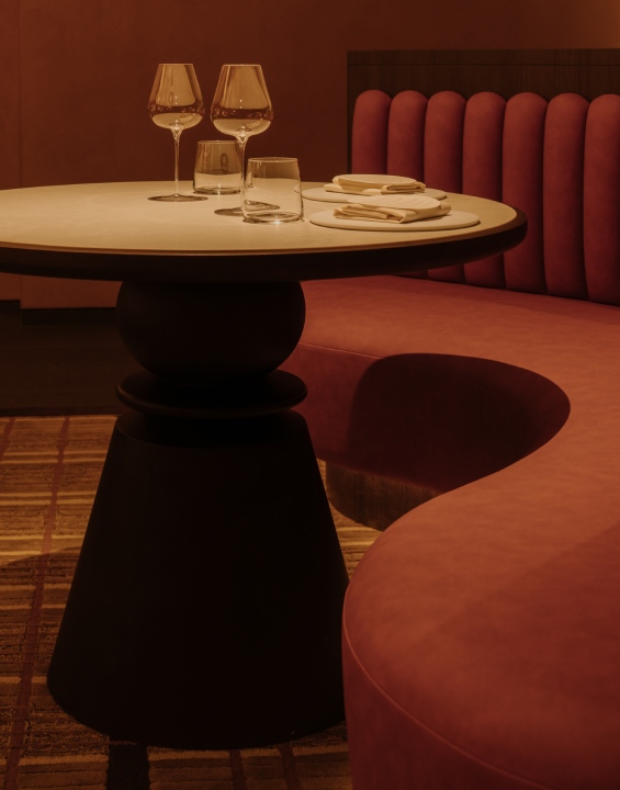 Chefs preparing modern Indian fine dining dishes in Thevar's open kitchen